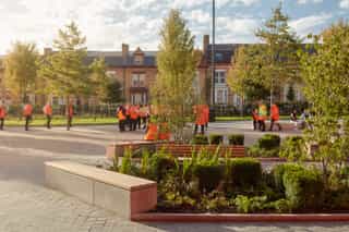 A photo of the planting and seating outside Anfield Stadium