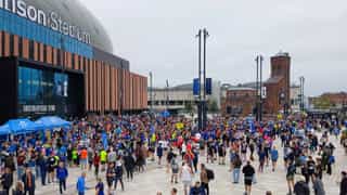 Thousands of fans gather outside the Hill Dickinson stadium in the fan plaza before starting the Everton 10k.