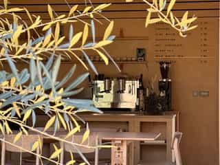 An image from outside looking in to the coffee machine and grinder in the Standish Gatehouse